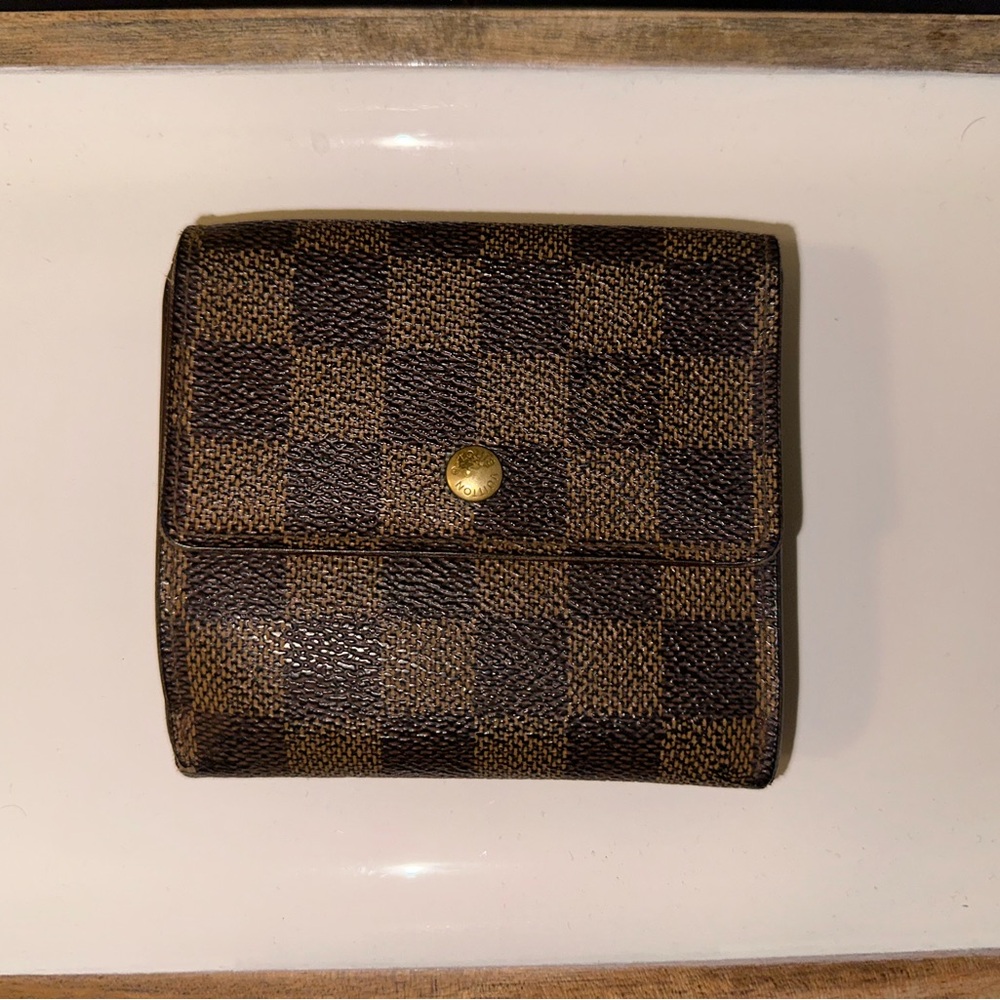 SOLD 
Louis Vuitton Damier Ebene Compact Wallet